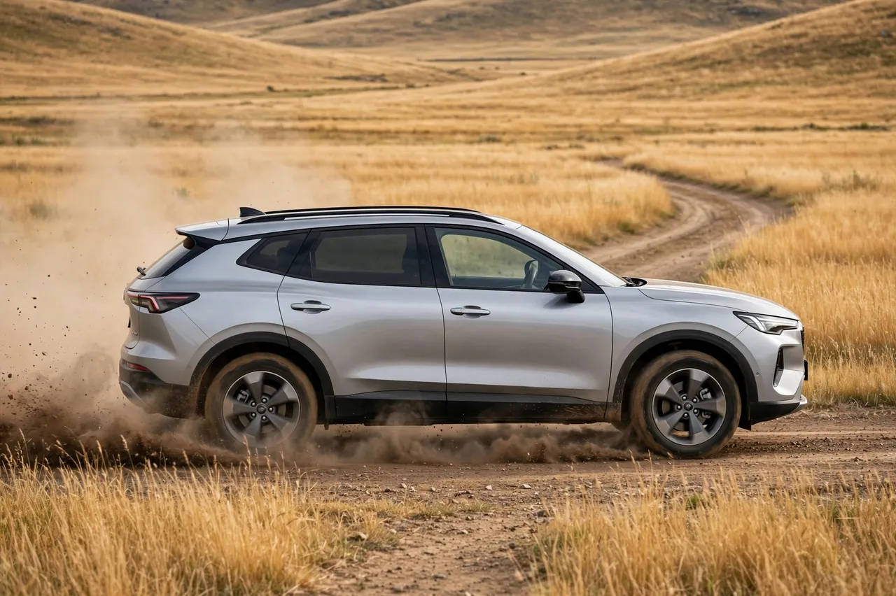 Side view of a silver modern SUV driving on a dirt track kicking up dust through golden grassland
