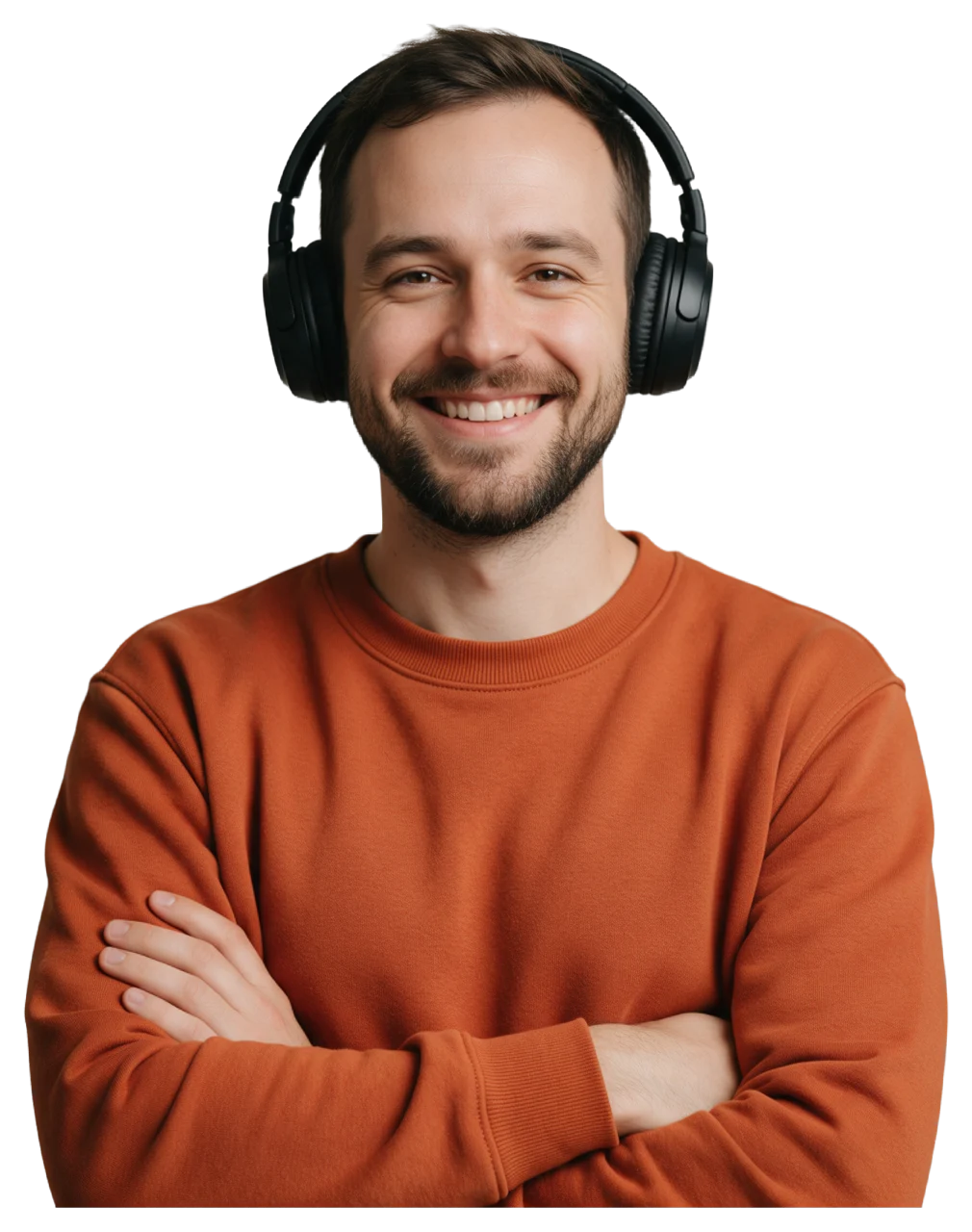 Waist-up portrait of a smiling bearded man with crossed arms and black over-ear headphones