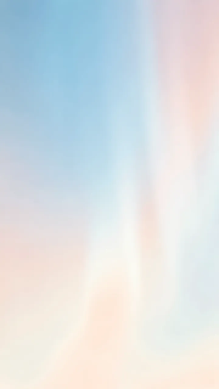 Smooth vertical gradient of soft blue, warm peach, and pearlescent white blended gently together
