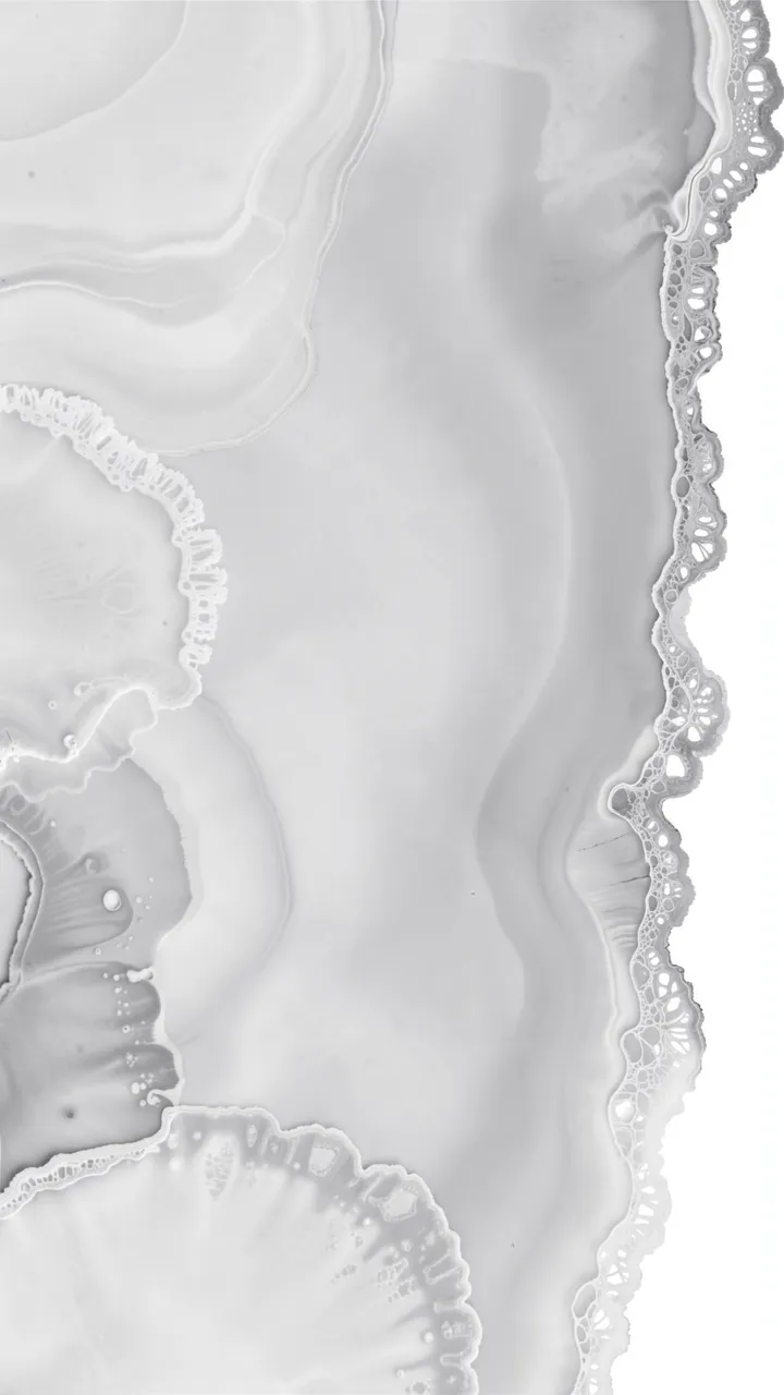 Vertical monochrome fluid art with smooth gray and white gradients and delicate lacy edges