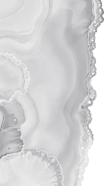 Vertical monochrome fluid art with smooth gray and white gradients and delicate lacy edges