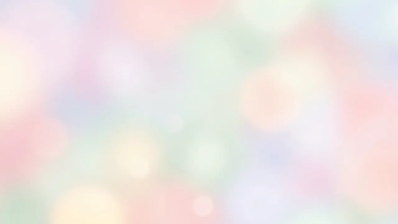 Blurred soft focus pastel background with gentle glowing light leak bokeh highlights