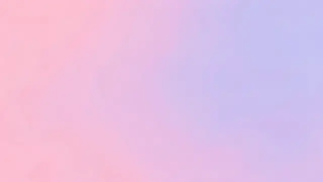 A smooth, seamless soft gradient transitioning from light pink to pale lavender across the full frame