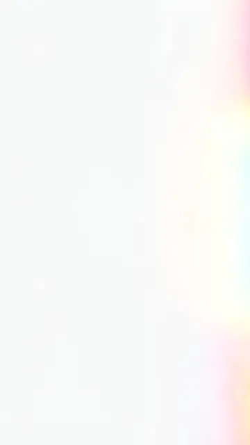 Tall vertical empty white background with soft diffused rainbow light leaks along the right edge