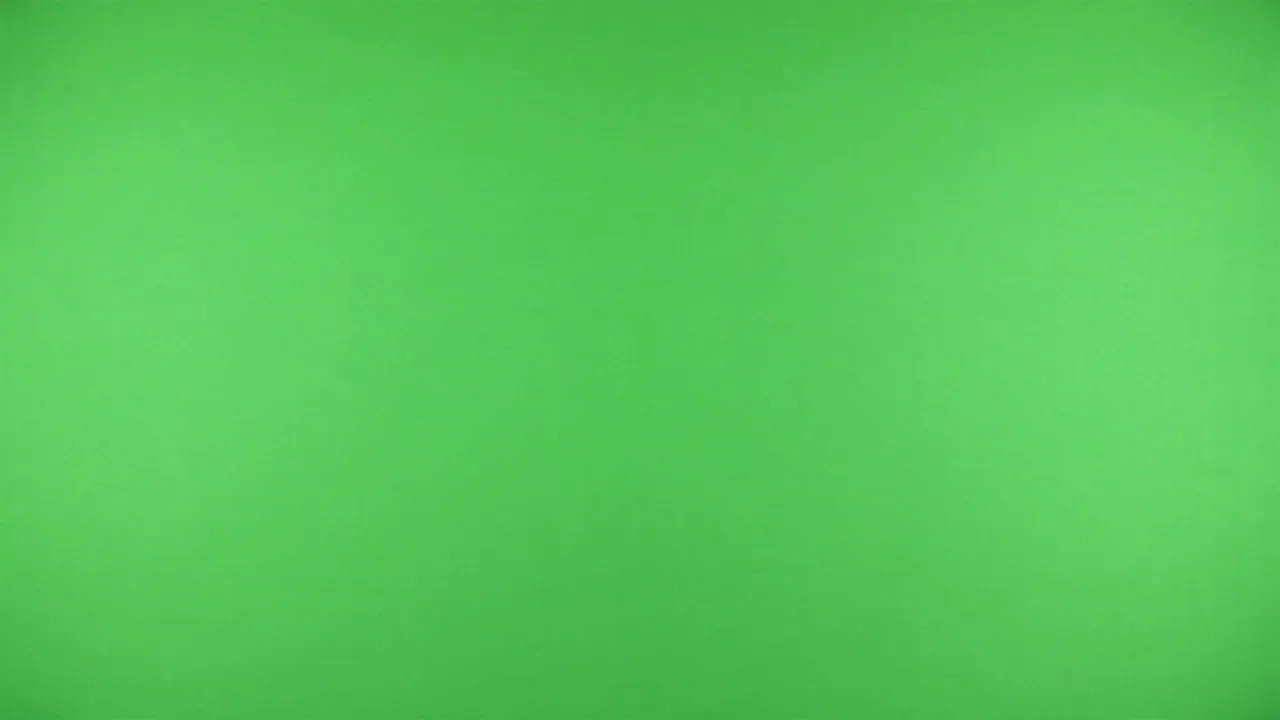 Uniform flat bright green chroma key studio backdrop filling the entire frame