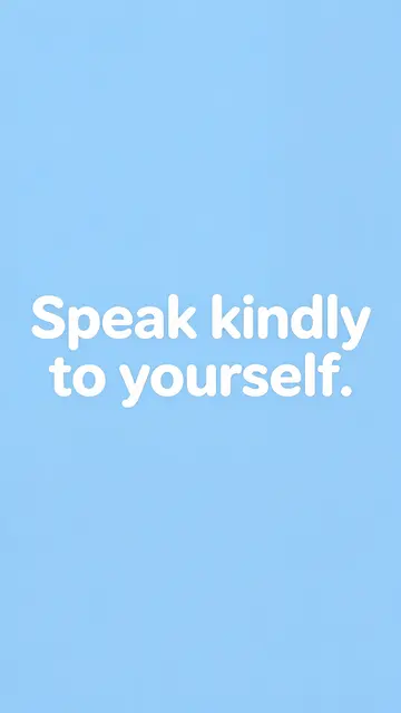 The text "Speak kindly to yourself." in large rounded white sans-serif type on a pale sky blue phone wallpaper background.