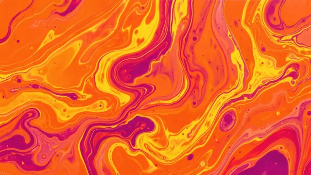 Swirling abstract acrylic pour pattern in bright orange, yellow and magenta tones