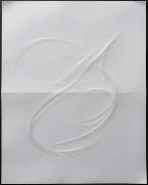 Translucent white backlit paper with long swirling embedded silk fibers filling the full frame