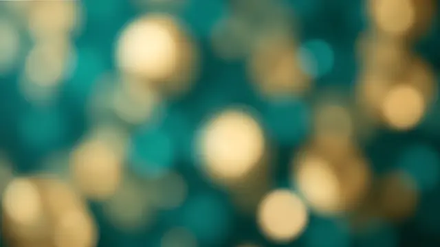 Soft out-of-focus circular bokeh lights in warm gold against a deep teal backdrop