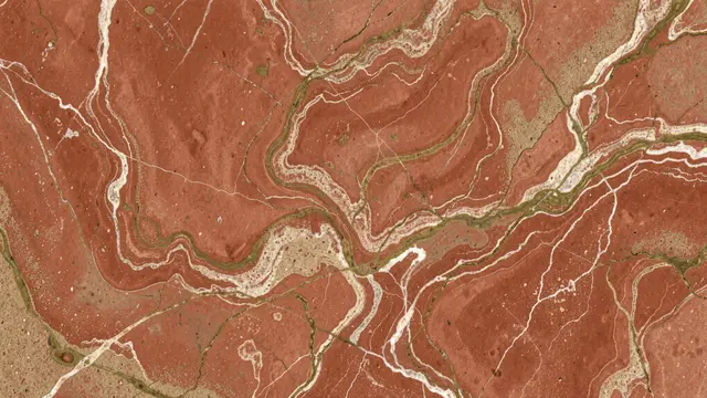 Full frame view of marbled paper with swirling terracotta, sand, and olive stone-like veins