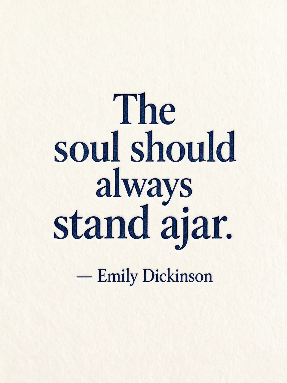 Deep navy letterpress quote reading "The soul should always stand ajar. — Emily Dickinson" on cream textured cotton paper