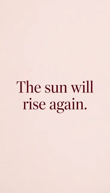 Centered deep burgundy serif text reading "The sun will rise again." on a soft blush pink background