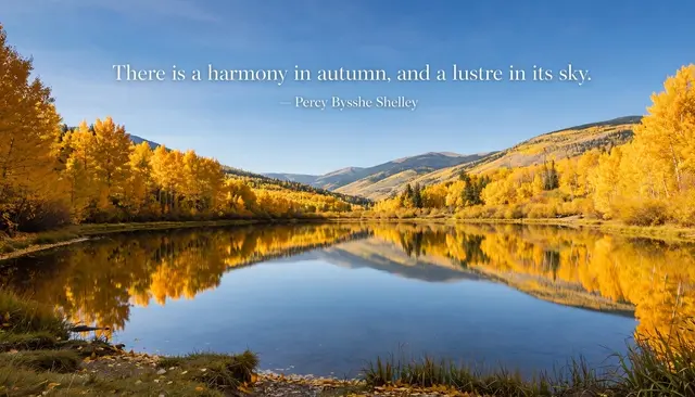 Calm lake reflecting golden autumn trees under clear blue sky, with quote "There is a harmony in autumn, and a lustre in its