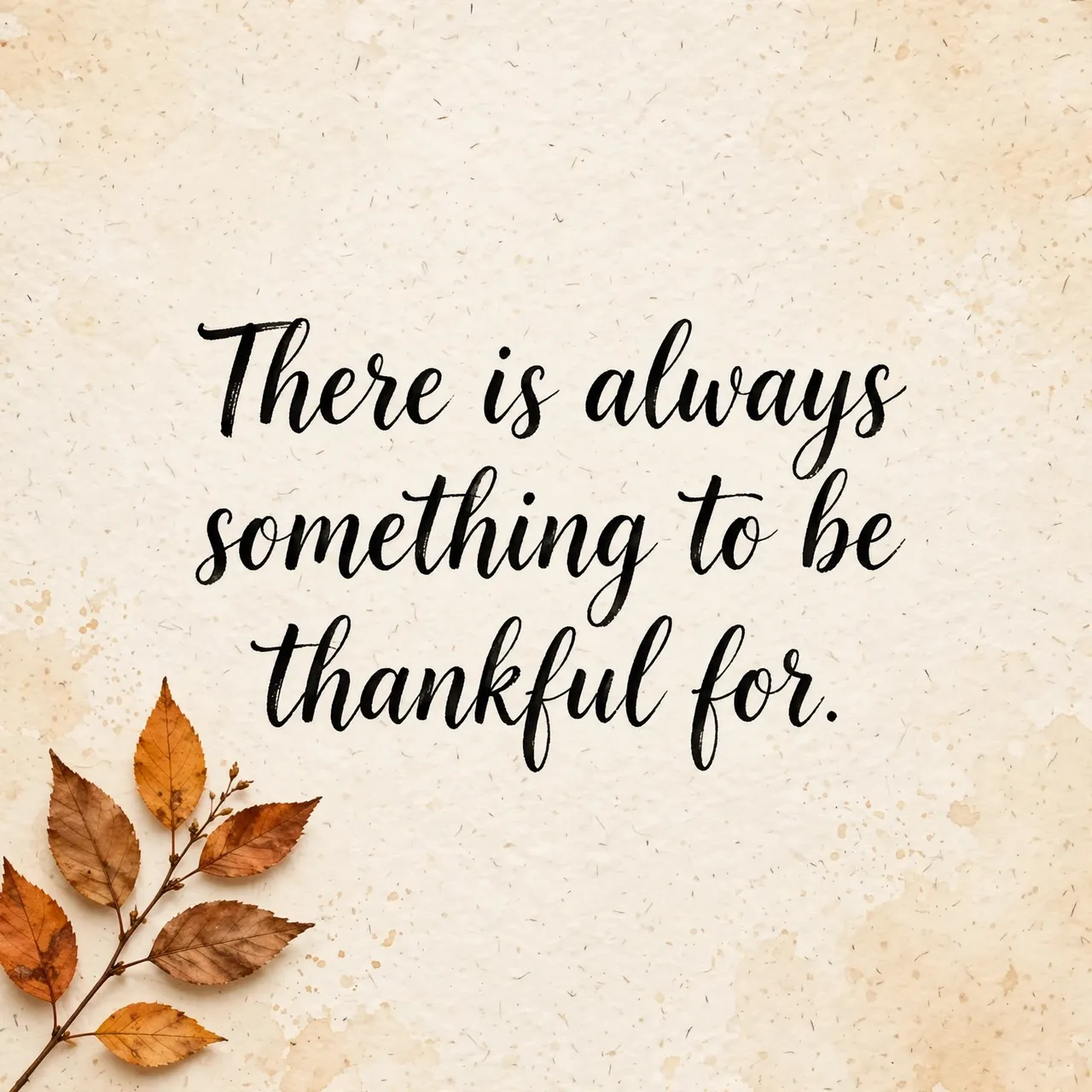 Black brush lettering reading "There is always something to be thankful for." sits on warm cream textured paper with a sprig
