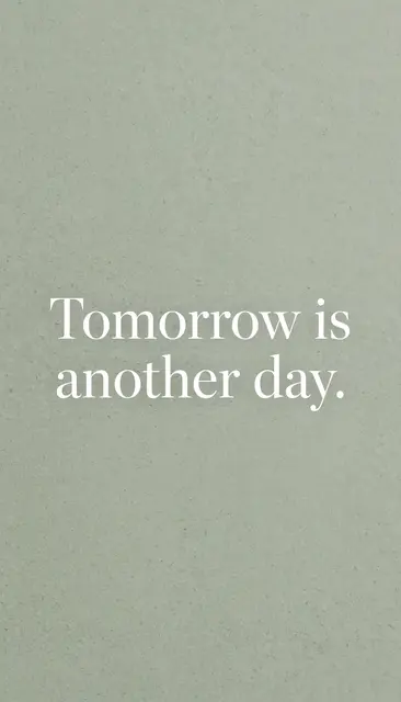 Minimal vertical phone wallpaper with soft sage grainy background and centered white serif text reading "Tomorrow is another