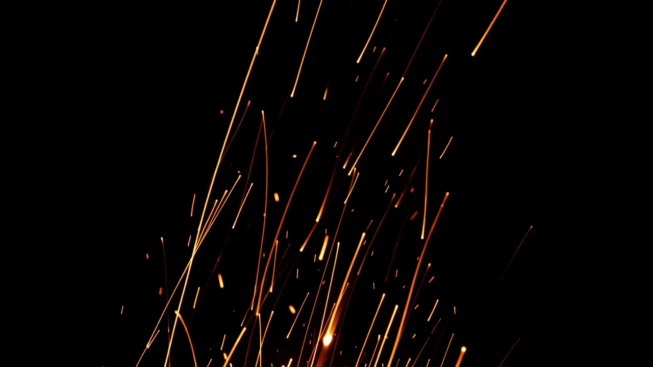 Long exposure streaks of glowing orange embers rise upward against a solid pure black background
