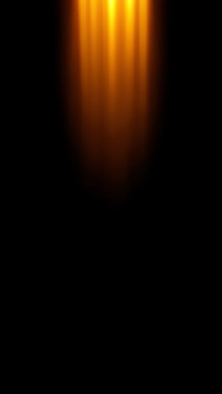 Soft vertical glowing amber light leak descending from the top against a solid black background