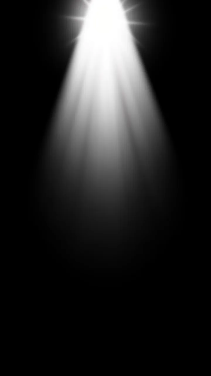 A vertical cool white spotlight flare with soft fanning rays extends down from the top against solid black