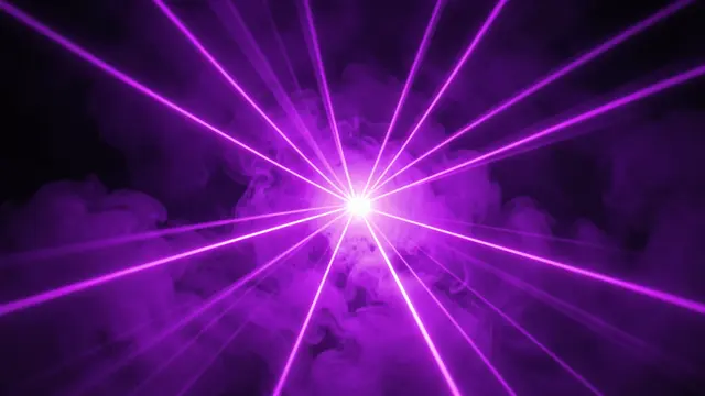 Bright central light emits fanning violet laser beams through wispy purple smoke against a black background