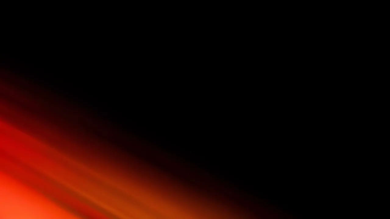 Soft red and amber diagonal light streaks extend from the bottom left against solid black