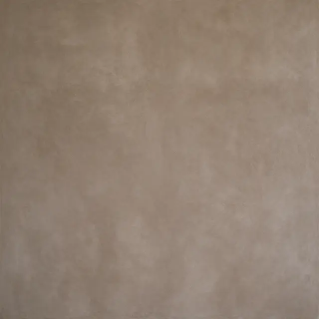 Full frame smooth warm taupe roman clay plaster surface with gentle tonal variation