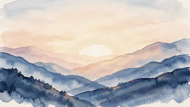 Soft watercolor wash of layered blue hills with warm sunrise glow and empty sky space