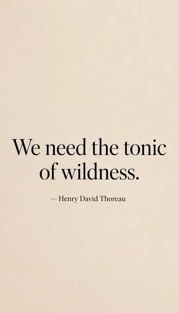 Vertical warm sand beige minimalist wallpaper displaying the quote "We need the tonic of wildness. — Henry David Thoreau" in