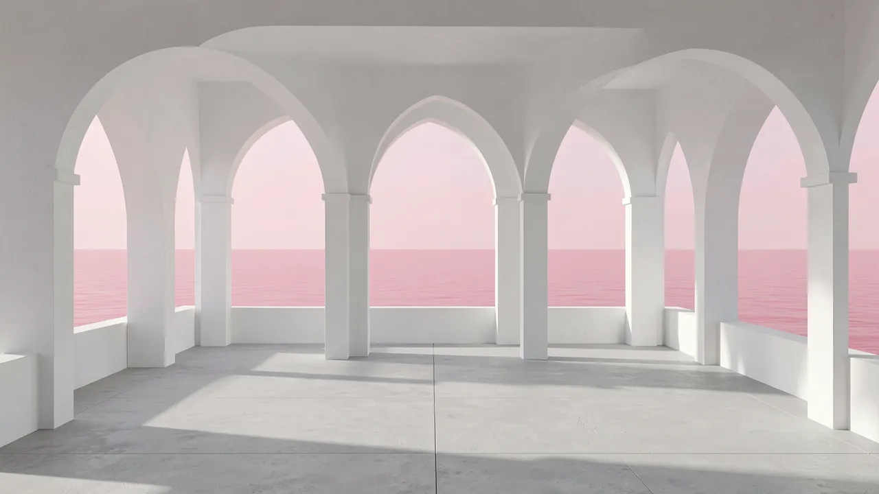 Empty sunlit terrace lined with white arches overlooking a calm soft pink sea