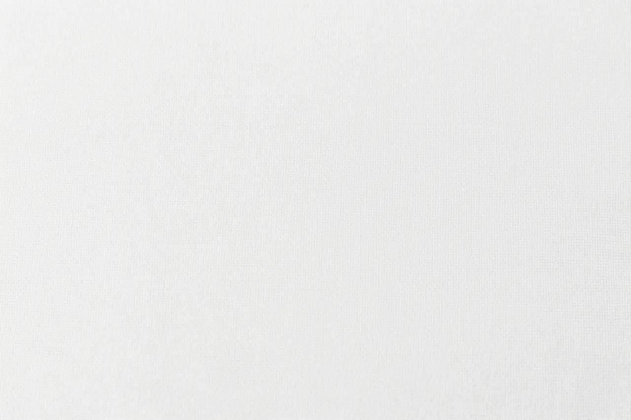 Full frame close-up of fine weave bright white cotton fabric