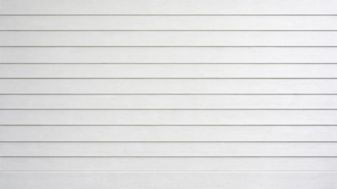 Full frame view of flat-lit white painted horizontal shiplap planks with thin shadow gaps and faint wood grain