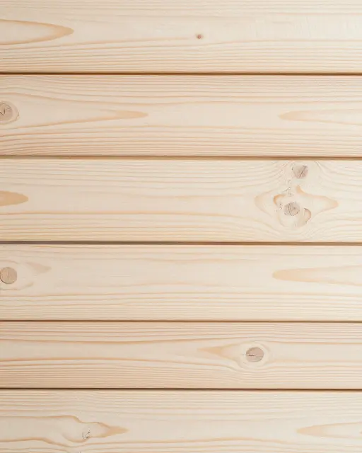 Full frame close-up of horizontal whitewashed pine planks with visible grain and natural knots