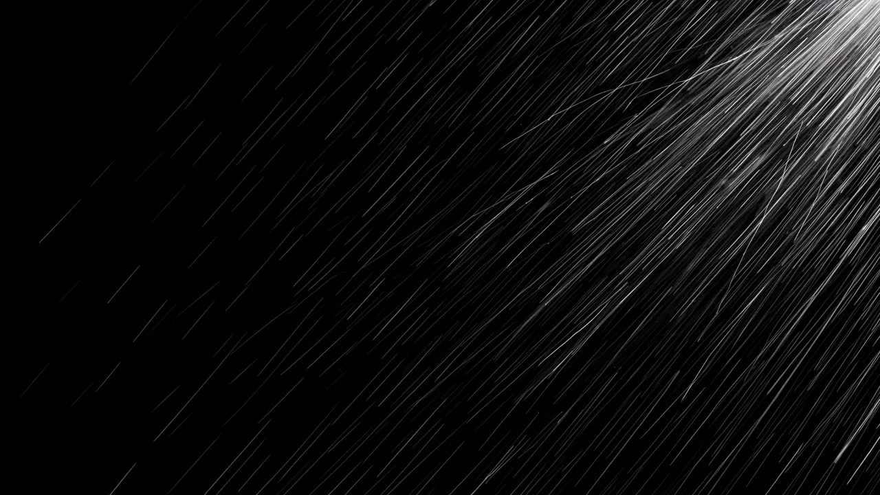 Slanting wind-driven rain streaks fall diagonally from the right across a solid pure black background