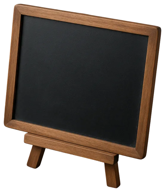 Small blank black chalkboard sign mounted on a solid wooden tabletop easel