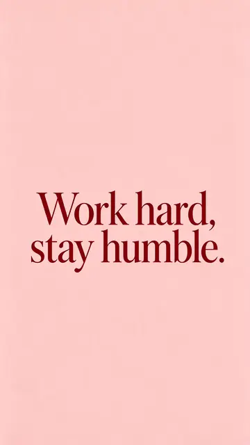 Centered deep burgundy serif text reading "Work hard, stay humble." on a blush pink vertical phone wallpaper background