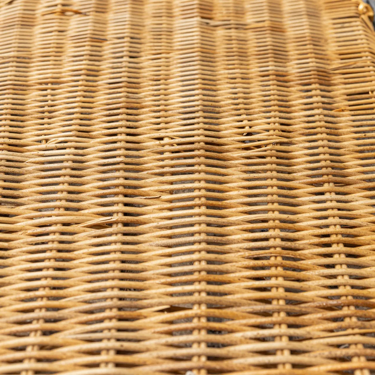 Full frame close-up of tight golden-brown willow wicker woven across the entire frame