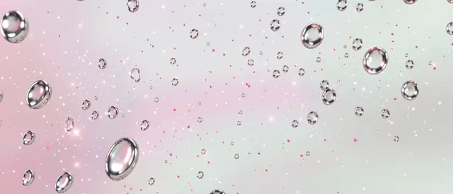 Glossy silver droplets and pink sparkles float across a soft pearlescent pink and pale green gradient background