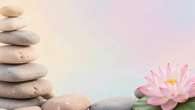 Stacked smooth zen stones and a pink lotus flower sit against a soft pastel gradient background with empty copy space.