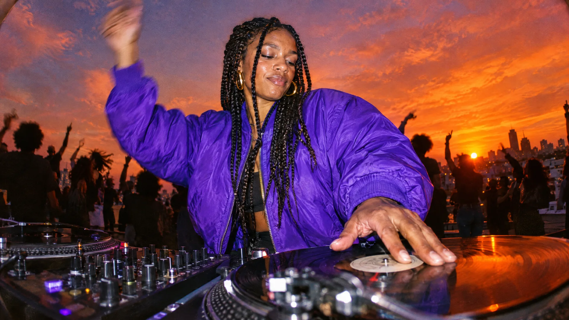 A DJ with box braids in an electric-violet bomber jacket plays records on a rooftop at sunset, one hand raised, a crowd jumping behind her against an orange sky, lit by flash. Made through BudgetPixel's MCP server with GPT Image 2.5 Flare.