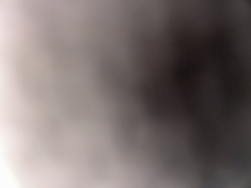 "Smooth abstract gradient background transitioning from pale warm beige on the left to deep dark ...