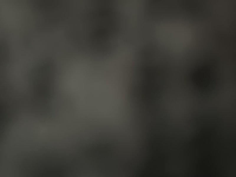Blurred monochrome grayscale abstract background with soft diffused foggy gray shading, no distin...