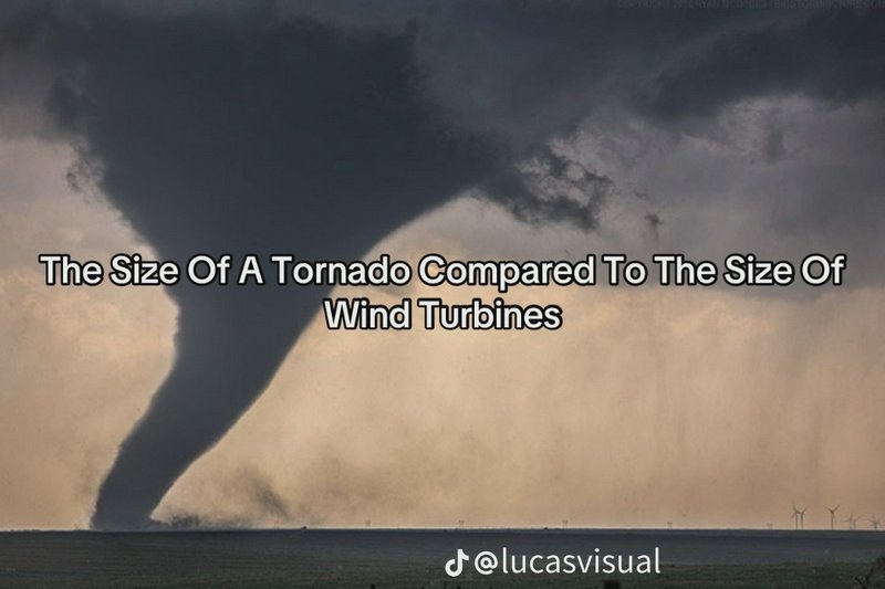 Massive tornado funnel over flat plains, distant wind turbines for scale, overlay text compares t...