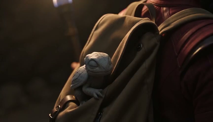 Cute sleepy baby turtle peeks out from the pocket of a character's tan canvas backpack