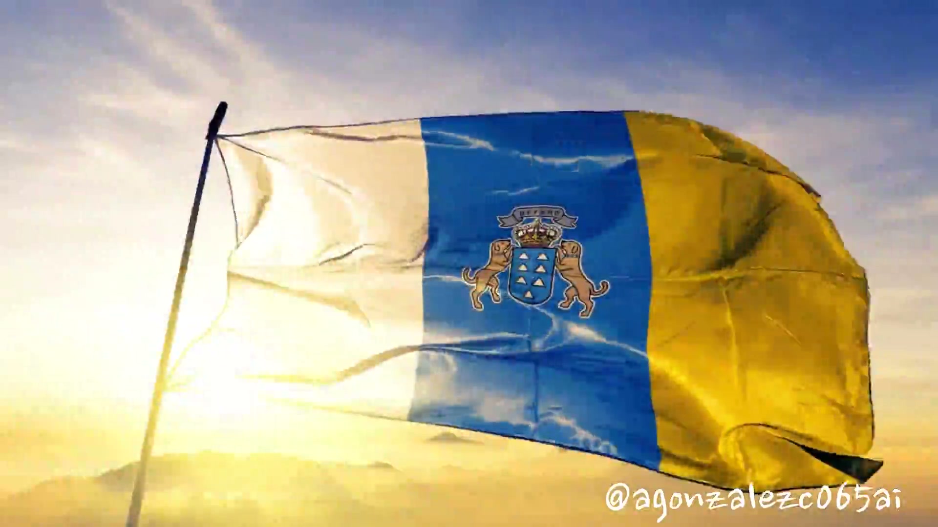 Waving Canary Islands flag with official coat of arms, backlit against a glowing golden sunset sky.