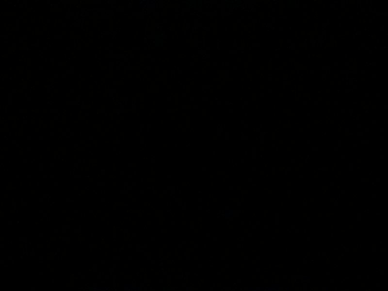 Solid black image with no visible subject or details.