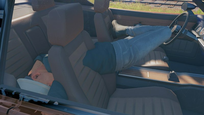 Glitched video game character clipped inside a car, head on rear seat, distorted legs propped on driver steering wheel