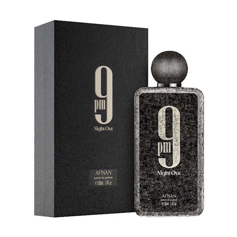 Textured Afnan 9 PM Night Out perfume bottle displayed next to its matte black gift packaging on ...