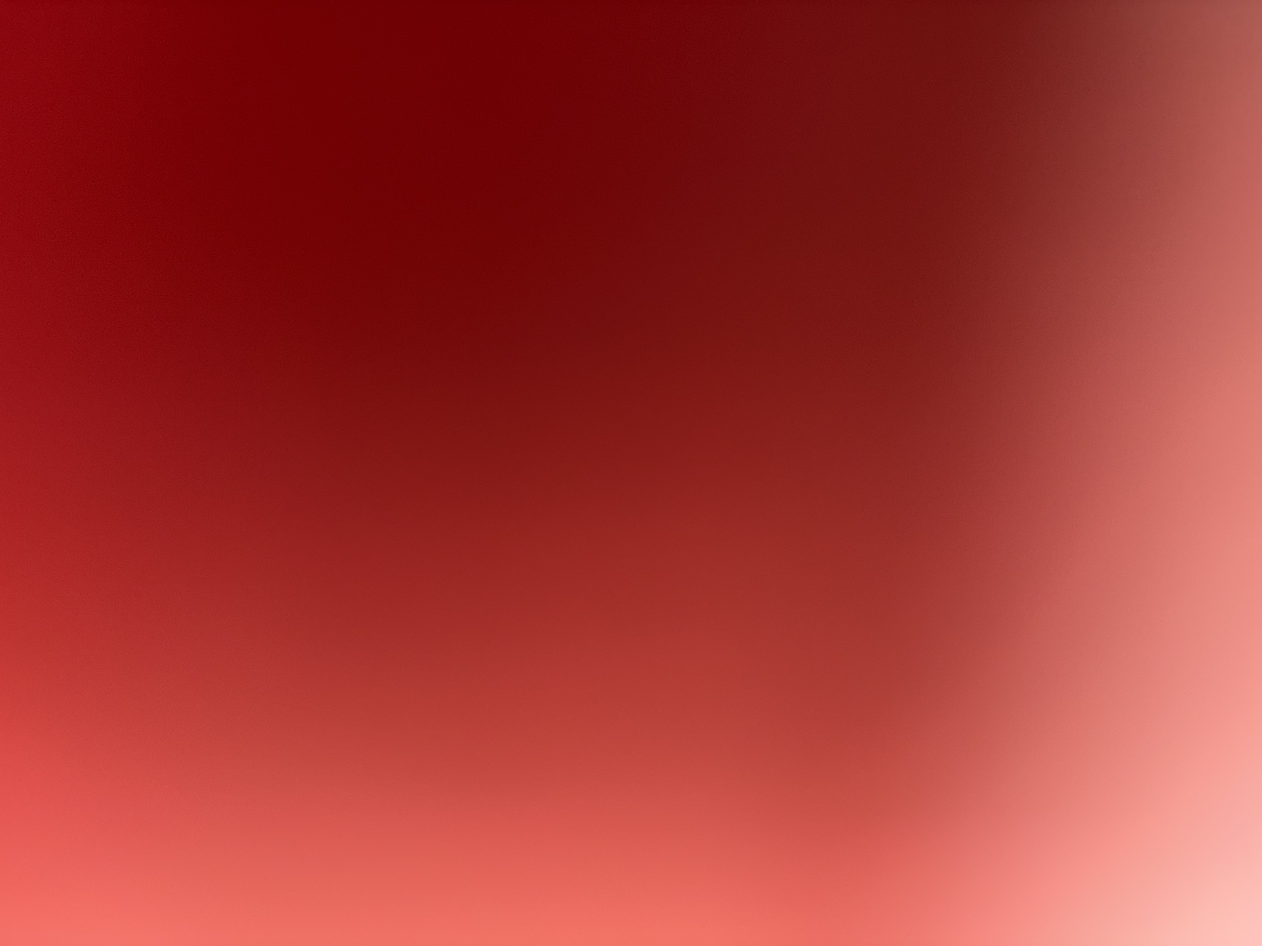 Smooth seamless gradient transitioning from deep dark burgundy red to soft pale warm peach tones