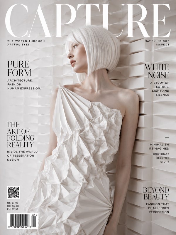 CAPTURE fashion magazine cover featuring a model in an origami-style white gown against a geometr...