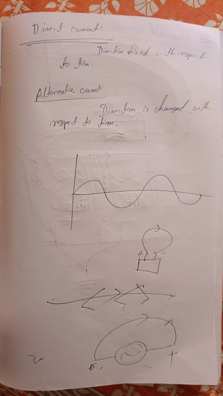 Handwritten physics study page explaining direct vs alternating current with a sketched AC sine w...