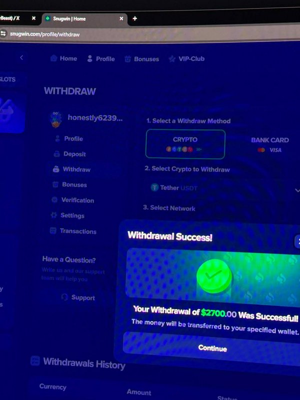 Screenshot of Snugwin platform showing successful $2700 crypto withdrawal confirmation popup on d...
